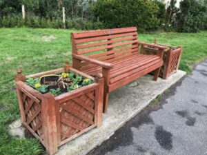 Image showing bench on grass verge on A30 in Sennen